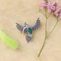 Серебряная брошь-кулон с зелёным агатом и марказитами огранки Swarovski Экзотическая птица