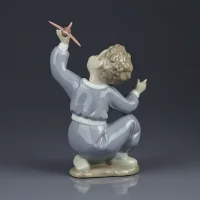 Винтажная фарфоровая статуэтка Мальчик с самолётом Пилот Lladro NAO 1133 Jet Pilot