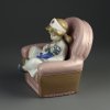 Винтажная фарфоровая статуэтка Девочка с куклой в кресле Медсестра Испания Lladro NAO 1055 Playing Nurse