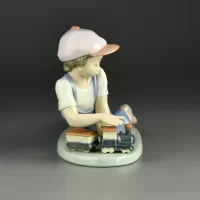 Винтажная фарфоровая статуэтка Испания Мальчик с паровозиком Lladro 7619 All Abroad