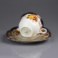 Фарфоровое чайное трио с цветочным орнаментом Crown Staffordshire Англия первая половина XX века