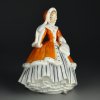Винтажная фарфоровая статуэтка Дама с муфтой Англия Royal Doulton 2179 Noelle