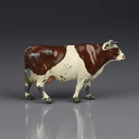 Антикварная английская фигурка коровы Britains Ltd