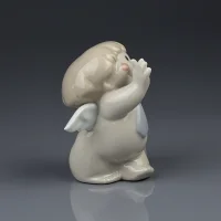 Винтажная фарфоровая статуэтка Ангелок в галстуке с портфелем NAO Off to a new job Cheeky Cherub