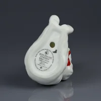 Винтажная фарфоровая статуэтка Рождество Малыш с подарком Англия Royal Doulton HN4427 Baby's First Christmas