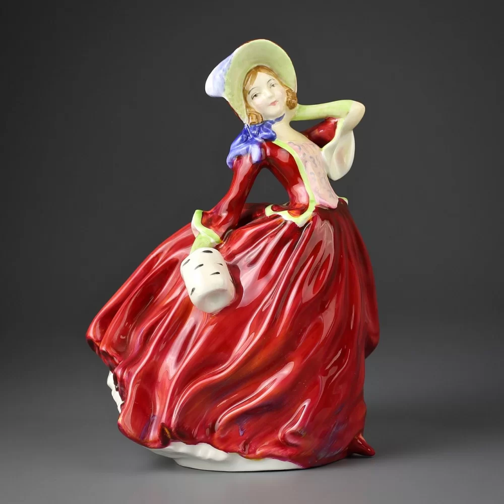 Винтажная фарфоровая статуэтка Девушка в красном платье Англия Royal Doulton Autumn Breezes