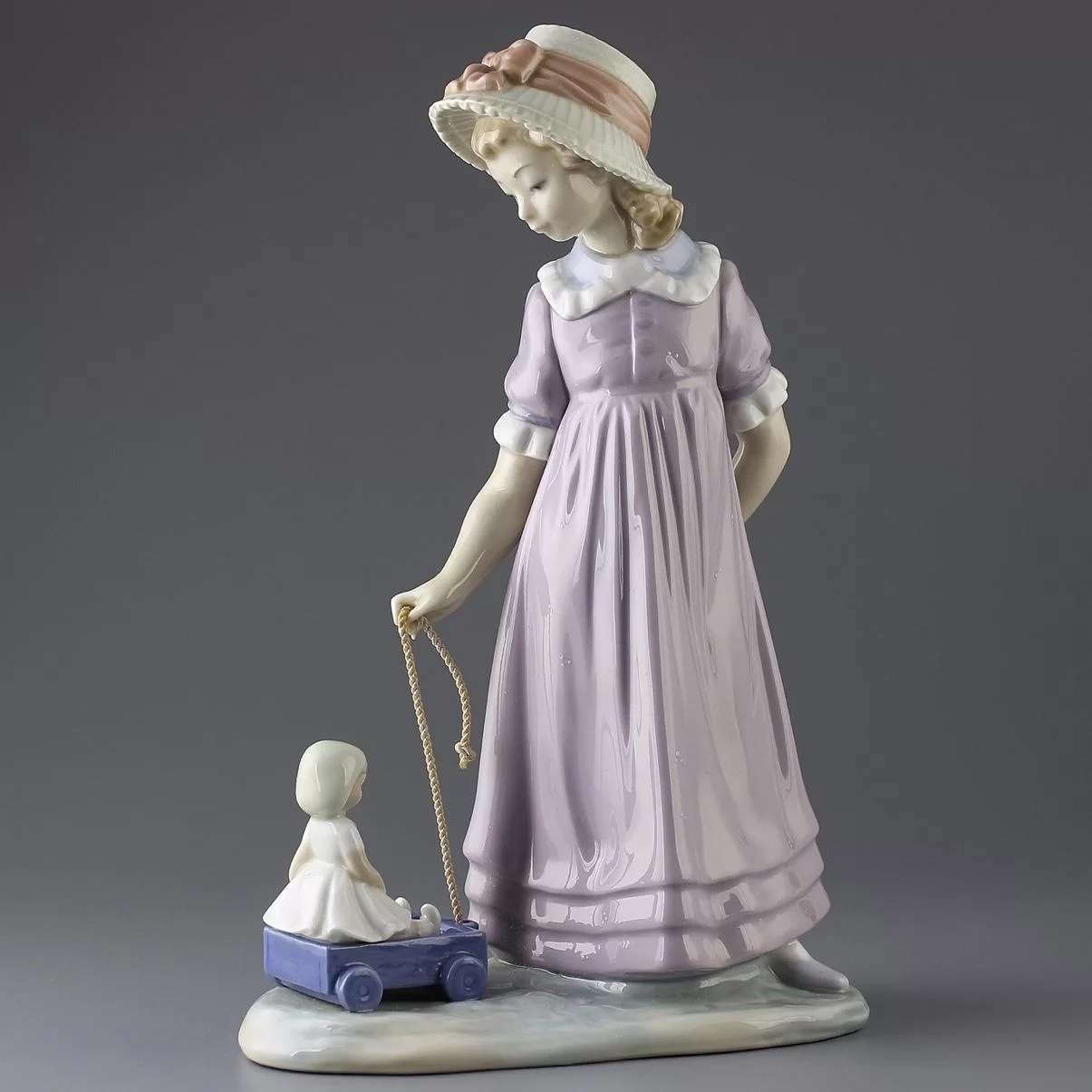 Винтажная фарфоровая статуэтка Испания Lladro 5044 Pulling Dolls Carriage Девочка с куклой в коляске