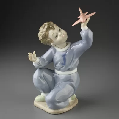 Винтажная фарфоровая статуэтка Мальчик с самолётом Пилот Lladro NAO 1133 Jet Pilot