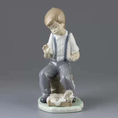 Винтажная фарфоровая статуэтка Мальчик с собакой Lladro NAO Homesick Friend