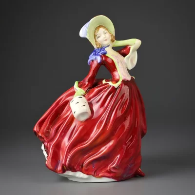 Винтажная фарфоровая статуэтка Девушка в красном платье Англия Royal Doulton Autumn Breezes